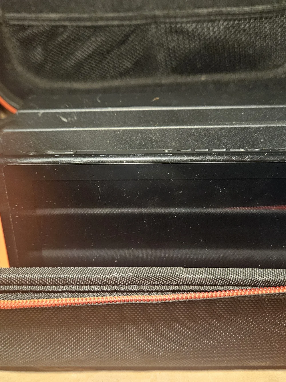 Nintendo Switch Console with Orange Left & Blue Right Joy-Con and Travel Case